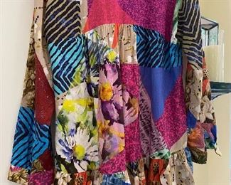 Lot 9154. $32.00. Colorful top by "Conditions Apply" Size Medium, Owner thinks she got this at Anthropologie, Front Measures 27.5" long and rear is longer, at 32.5".  Top is gathered under bust, and swingsout in a swing fashion., Long sleeve with buttons at wrist.  So adorable!