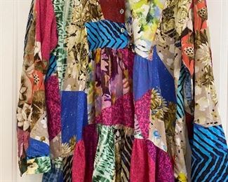 Lot 9154. $32.00. Colorful top by "Conditions Apply" Size Medium, Owner thinks she got this at Anthropologie, Front Measures 27.5" long and rear is longer, at 32.5".  Top is gathered under bust, and swings out in a swing fashion., Long sleeve with buttons at wrist.  So adorable!