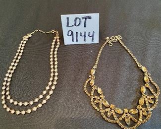 Lot 9144. $78.00. Two knock-out necklaces by J. Crew - one double strand gold toned crystal beaded, and the other is amber or topaz colored clusters that look sensational on!  Awesome gift ideas, too and in perfect condition, both signed by J. Crew.