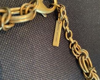 Lot 9143. $132.00. Lot of two interesting Designer Necklaces - one by Chan Luu and one by Marc Jacobs.  The Jacobs piece has a chain with stars and moon "charms"  and Chan Luu always seems to blend various textures of beads, colors, and ribbons.  