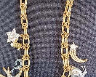 Lot 9143. $132.00. Lot of two interesting Designer Necklaces - one by Chan Luu and one by Marc Jacobs.  The Jacobs piece has a chain with stars and moon "charms"  and Chan Luu always seems to blend various textures of beads, colors, and ribbons.  