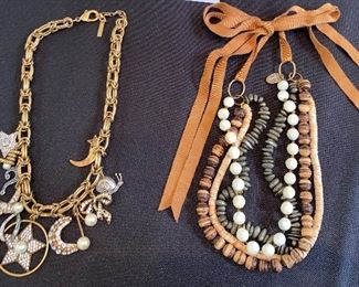 Lot 9143. $132.00. Lot of two interesting Designer Necklaces - one by Chan Luu and one by Marc Jacobs.  The Jacobs piece has a chain with stars and moon "charms"  and Chan Luu always seems to blend various textures of beads, colors, and ribbons.  