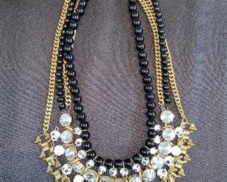 Lot 9142. $60.00. Lot of 4 Costume Jewelry Necklaces, multi -strand except for the large Betty Rubble pearl necklace; all of them make a statement.  See pics for closeups and a better description.  All are unbranded and vintage.