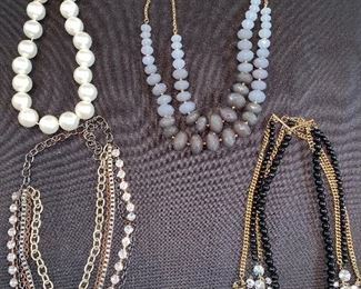 Lot 9142. $60.00. Lot of 4 Costume Jewelry Necklaces, multi -strand except for the large Betty Rubble pearl necklace; all of them make a statement.  See pics for closeups and a better description.  All are unbranded and vintage.