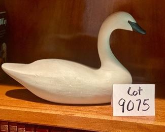 Lot 9075. $55.00. Roy Smith signed Long Neck White Goose Decoy, measures 14" W x 9.5" T x 5" D.  Really pops on a Dark Shelf.
