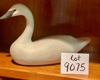 Lot 9075. $55.00. Roy Smith signed Long Neck White Goose Decoy, measures 14" W x 9.5" T x 5" D.  Really pops on a Dark Shelf.