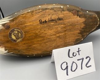 Lot 9072. $68.00. Bob Hayden signed Windy Creek Inc. Painted Loon Decoy has brass ID medallion, c. 1987-88,  18" w x 7"d x 6.5" tall. Cool Decoy.  