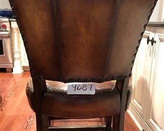 Lot 9087.   $360.00 for Three Williams-Sonoma bar stools with metal wrapped foot bar and nail head trim.  Faux leather with distressed look.  The stools retailed for over $1,000 each, yours for a fraction of that if you are the buyer!