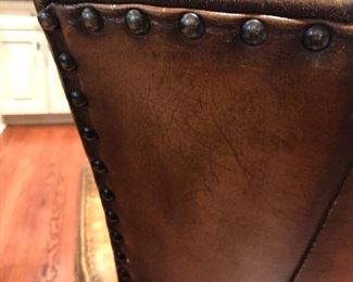 Lot 9087.   $360.00 for Three Williams-Sonoma bar stools with metal wrapped foot bar and nail head trim.  Faux leather with distressed look.  The stools retailed for over $1,000 each, yours for a fraction of that if you are the buyer!