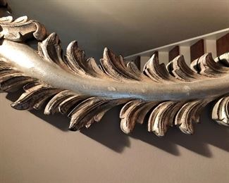 Lot 9103 #285.00. Beautiful, oval mirror with stunning  wood frame, highly detailed and finished in platinum/silver tones.