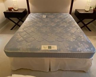 Lot 9176.  $1,200.00. Anthropologie Queen wood and cream upholstered bed, with a Stearns & Foster mattress. 	head board: 67" W x 66" H