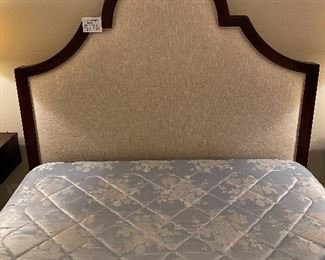 Lot 9176.  $1,200.00. Anthropologie Queen wood and cream upholstered bed, with a Stearns & Foster mattress. 	head board: 67" W x 66" H