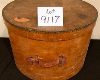 Lot 9117. $95.00  Antique wooden grain measure, with metal seals on the seams and a leather handle.  	20" Di x 13" T