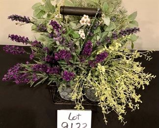 Lot 9122.  $40.00 Wire basket with and and 6 metal canisters of faux greener.  Adorable.	12" W x 8" Deep x 14" to top of greenery