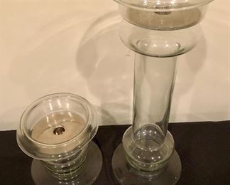 Lot 9127.  $40.00  Two clear glass candle holders, great for pillar candles and they each have a  taper holder in the base as well.  Versatile, clean style.	16" T and 6 " T , both with 6.5" base