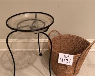 Lot 9131. $40.00 Tripod, metal plant stand with plastic tray and two woven, handled pant baskets.	stand 20.5" T x 12.5" W