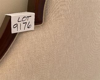 Lot 9176.  $1,200.00. Anthropologie Queen wood and cream upholstered bed, with a Stearns & Foster mattress. 	head board: 67" W x 66" H