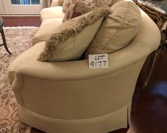 Lot 9177.  $495.00. Sherrill upholstered, cream color, skirted sofa with 4 decorative pillows  84" W x 36"  x 42" D. Fabulous!  
