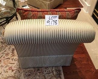 Lot 9178.  $225.00 each.  Two upholstered armless, slipper chairs in striped gold color tones and two Pottery Barn red & green paisley pillows.