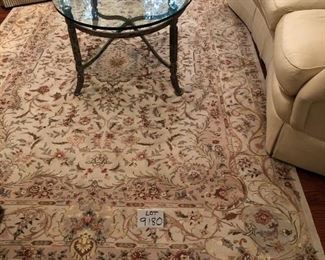 Lot 9180.  $345.00. Lovely 6x9' Area Rug, in beautiful cream, brown and rose colors.  It appears to be wool, however there is no tag on the underside.  