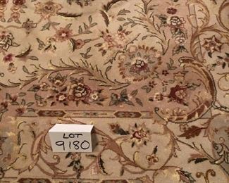 Lot 9180.  $345.00. Lovely 6x9' Area Rug, in beautiful cream, brown and rose colors.  It appears to be wool, however there is no tag on the underside.  