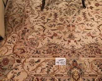 Lot 9180.  $345.00. Lovely 6x9' Area Rug, in beautiful cream, brown and rose colors.  It appears to be wool, however there is no tag on the underside.  