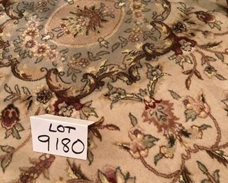 Lot 9180.  $345.00. Lovely 6x9' Area Rug, in beautiful cream, brown and rose colors.  It appears to be wool, however there is no tag on the underside.  