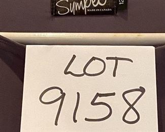 Lot 9158.  $30.00 Charcoal grey, sleeveless blouse made in Canada by Simpli.  This company makes the most comfortable clothes that fit true to size.	Sz 12