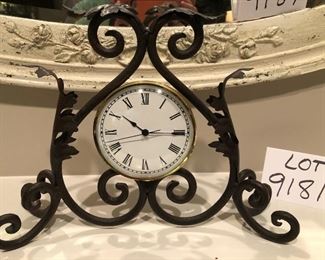 Lot 9181. $40.00.  Iron and metal, unbranded mantel/desk clock.  Very cute accent piece.