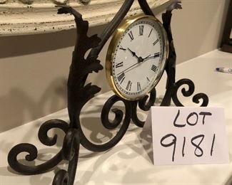 Lot 9181. $40.00.  Iron and metal, unbranded mantel/desk clock.  Very cute accent piece.