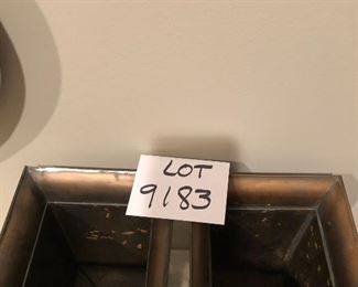 Lot 9183.  $45.00 A stylish pair of mirrored, metal vases.