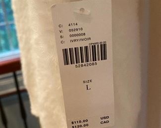 Lot 9162. $40.00.  Short sleeved, super soft sweater top from Anthropologie, New With Tags. pd $110.00