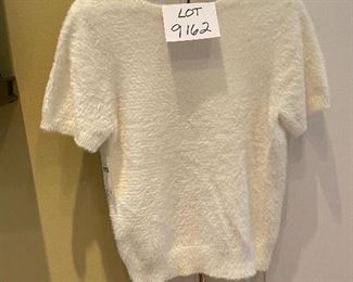 Lot 9162. $40.00.  Short sleeved, super soft sweater top from Anthropologie, New With Tags. pd $110.00