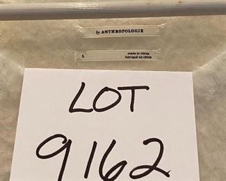 Lot 9162. $40.00.  Short sleeved, super soft sweater top from Anthropologie, New With Tags. pd $110.00