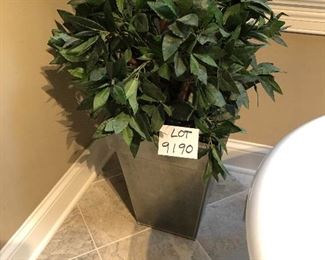 Lot 9190A&B. $130.00 each Tall decorative faux ficus tree, we have 2 of them.  Each tree is in a metal pot, and is approximately 6' tall and 24" wide.  Since these are large decorative pieces, we are selling them separately.