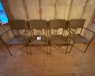 Lot 9193.  $120/set of 4  This set of 4 outdoor wicker chairs is unbranded, but of very good quality.  The outdoor wicker is tightly woven, shows no signs of wear and presents beautifully in a muted shade of taupe.	each chair: 22" W x 21" D x 35" H at the back
