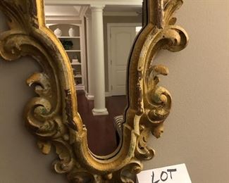 Lot 9192.  $60.00 for Pair of composite, vintage look mirrors. 	12" W x 24" H