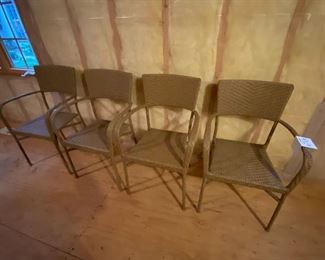 Lot 9193.  $120/set of 4  This set of 4 outdoor wicker chairs is unbranded, but of very good quality.  The outdoor wicker is tightly woven, shows no signs of wear and presents beautifully in a muted shade of taupe.	each chair: 22" W x 21" D x 35" H at the back