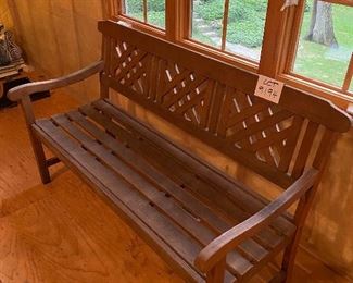 Lot 9194.  $285.00 Great for your patio, porch or yard, this teak bench by FSC is sturdy and in great condition.  The armed bench has triple panels in a cross hatch design on the back that gives it a nostalgic, yet contemporary vibe. 	58"W x 25" D x 34" H