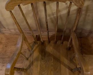 Lot 9195. $38.00 Vintage child's rocker in a natural finish.  This rocker has wear on the finish that can be easily re-finished.  Sturdy ane in otherwise great condition.	18"W x 22"D x 28"H