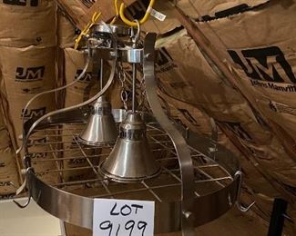 Lot 9199.  $125.00 Great stainless steel double light fixture and pot rack.  The clean lines of this piece lend themselves to just about any decor and would look great over an island cook top.	" D x 16"T