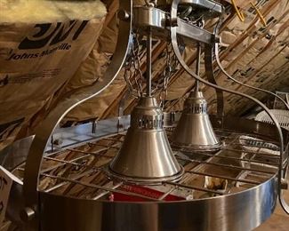 Lot 9199.  $125.00 Great stainless steel double light fixture and pot rack.  The clean lines of this piece lend themselves to just about any decor and would look great over an island cook top.	" D x 16"T