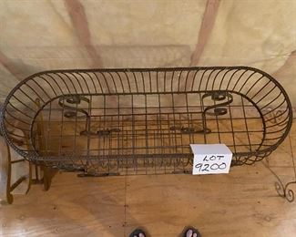 Lot 9200.  $95.00 Metal outdoor planter with 2 lower shelves.  This is a functional planter that looks great outdoors or in a sunroom.  	34"W x 12"D x 33.5"H