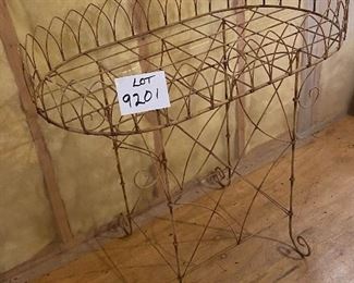 Lot 9201. $135.00 Another plant stand, but this is a vintage gem.  The large top tray can accommodate multiple potted plants and the spacious lower shelf can do double duty with more plants or garden accessories.  Might also be cute as a bar stand in a sunroom or patio.  Cute, nostalgic and in great shape.
