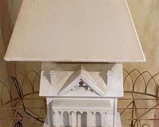 Lot 9202. $145.00 This lamp with a house base is doubly functional since the rooftop lifts and has storage for remotes!	26.5" T on a 13" x 6" base. Shade is 19" x 9"