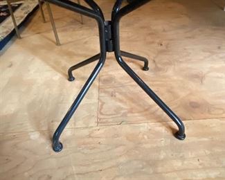 Lot 9207.  $300.00 Woodard black mesh top table for outdoor or indoor use.  This table still sparkles like the day it was purchased, clean, sturdy and carefully maintained.  Woodard is a premier outdoor furniture manufacturer.  It's made to last.	48"D x 29"T