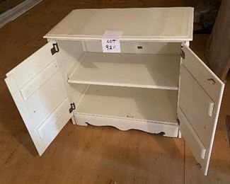 Lot 9211.  $55.00 Vintage White, double door wood cabinet with 2 interior shelves.  Great storage or bookcase for kids room.	32" W x 17.5" D x 29"T