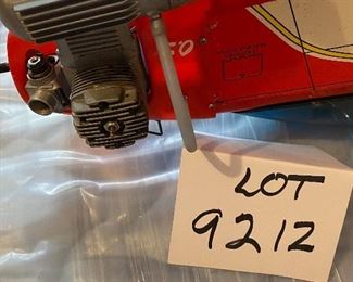 Lot 9212.  $80.00 Great Plains Radio Control Airplane - Ultra Sport 40. Red, needs wings., for parts only. 48"L x 22" Wx 11" T