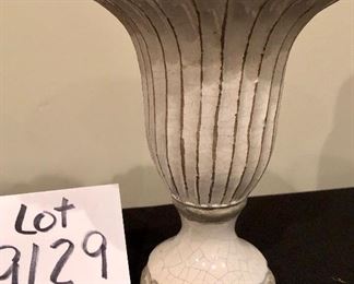 Lot 9129.  $28.00 Lot of two unique vases: a terra cotta vase with wide body and narrow neck and a glazed pottery vase on a square base.	terra cotta vase: 10" T x 7"W and pottery vase 7.5"T  x 5.5"