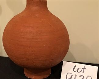 Lot 9129.  $28.00 Lot of two unique vases: a terra cotta vase with wide body and narrow neck and a glazed pottery vase on a square base.	terra cotta vase: 10" T x 7"W and pottery vase 7.5"T  x 5.5"